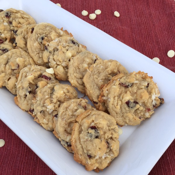 Cranberry Oatmeal Cookies - Bright cranberry and white chocolate flavors and a dough sweetened with coconut flakes make this oatmeal cookie stand out above many others.
