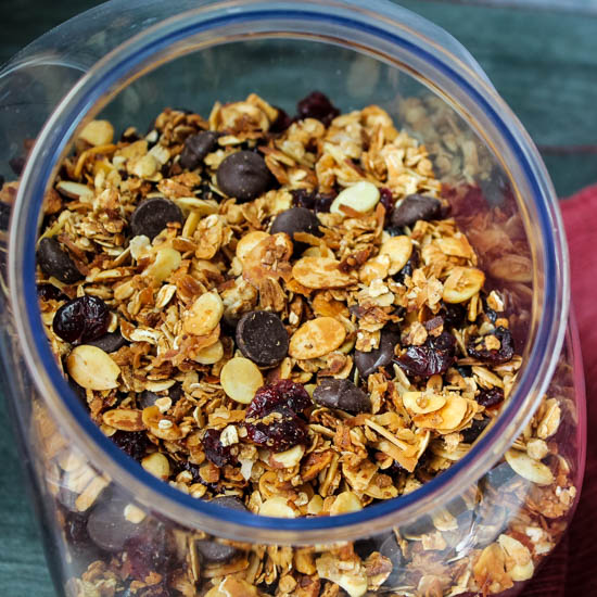 Rich dark chocolate, sweet coconut, and tart dried cherries make this homemade granola shine. Enjoy your indulgent homemade Dark Chocolate Cherry Coconut Granola as cereal, a yogurt topper, or a snack - you won't be disappointed.