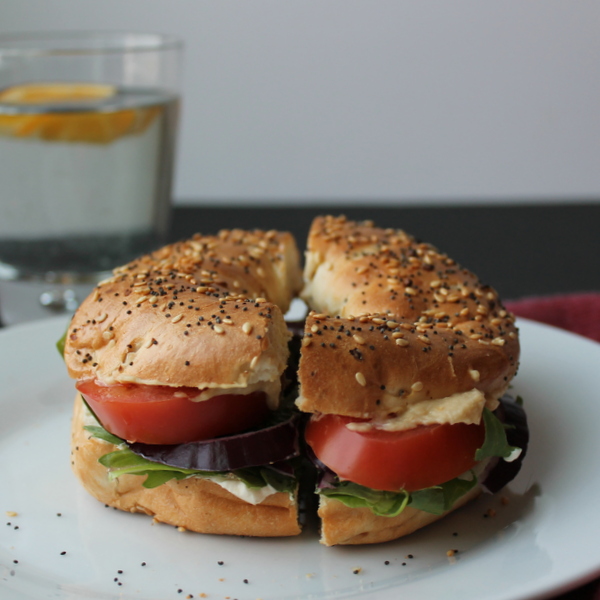 Veggie Bagel Sandwich: Crisp garden vegetables, protein-packed hummus and cream cheese, and a savory bagel come together in a make-at-home version of my favorite bagel sandwich from a popular bagel chain. 