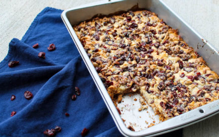 A sweet bar cookie gets a fall makeover. Fall Magic Bars are a twist on the 7-ingredient American classic bar cookie, this time with white chocolate chips and dried cranberries. Delicious on their own or warmed with a scoop of ice cream on top.