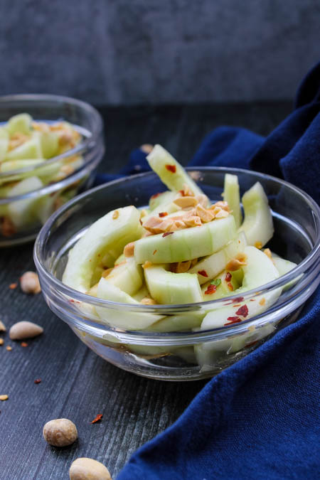 Sweet and spicy, with flavors of toasted sesame and fresh peanuts, this easy Asian Cucumber Salad is flavorful and light, a delicious and unique side dish.