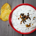 Caramelized onions infuse a traditional sour cream & mayonnaise combo to create a sweet homemade onion dip, a delicious accompaniment for fresh vegetables or salted potato chips.