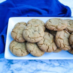 Molasses Cookies are a holiday classic. This copycat version of the cookie sold at a popular coffee shop is slightly crispy on the outside and super soft on the inside, making it one of our favorite versions of the cookie.