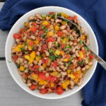 Black eyed peas and fresh veggies are combined to make a hearty, filling – and still healthy! – appetizer perfect for your next Game Day.