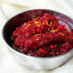 Cranberry Orange Relish - Tart cranberries are sweetened with sugar and an orange to create a relish perfect for the Thanksgiving table, a topping for breakfast favorites like french toast and waffles, or a spread for turkey sandwiches.