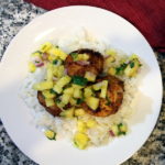 Overhead view of a plate of Jerk Scallops and Pineapple Salsa