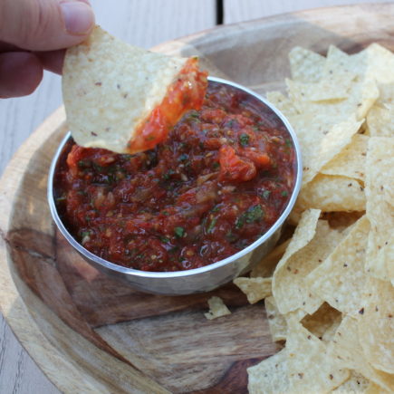 Garden fresh tomatoes, onions, and jalapenos are charred before being pureed into a smokey, simple Restaurant-Style Roasted Tomato Salsa.