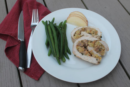 Tender turkey breast is stuffed with a sweet apple, cornbread and sausage stuffing for a satisfying, filling fall Sunday night dinner.