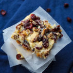 A sweet bar cookie gets a fall makeover. Fall Magic Bars are a twist on the 7-ingredient American classic bar cookie, this time with white chocolate chips and dried cranberries. Delicious on their own or warmed with a scoop of ice cream on top.