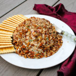 Salty bacon, zesty ranch and crunchy pecans make this Bacon Cheddar Ranch Cheeseball a hit.