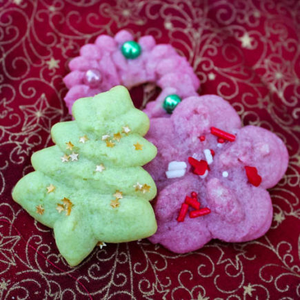 Classic Spritz are buttery, melt-in-your-mouth almond cookies - created in bright colors and topped with sprinkles - that are popular around Christmastime. These little cookies bring a fun bit of holiday cheer to lunchboxes, afternoon snacks or holiday dessert tables. 