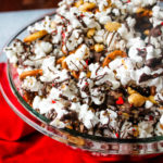 Sweet & Salty Valentine's Popcorn Mix - Salty popcorn and peanuts are drizzled with dark chocolate and topped with sprinkles for a Valentine's Day snack both adults and kids will love! 