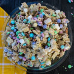 Chex cereal, Cheerios and pretzels are tossed with kids favorites (M&Ms and marshmallows!) and covered with a vanilla candy coating and springtime sprinkles to create this Cottontail Chex Mix, a festive snack that's hard to stop at just one handful. 