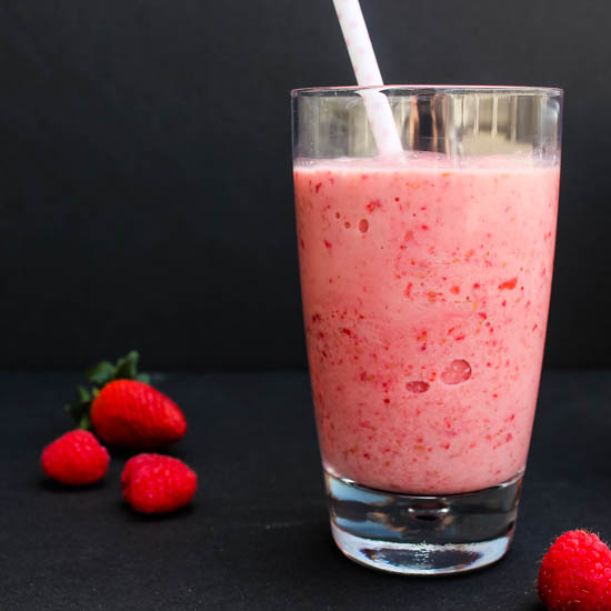 Fruit, yogurt and milk make this 5-minute, 4-ingredient Strawberry Raspberry Smoothie a filling but healthy breakfast or snack. 