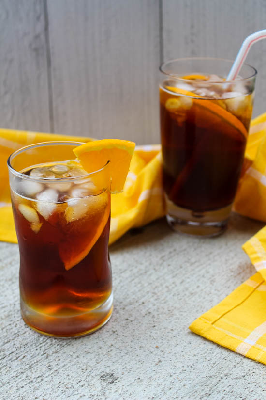 Unsweetened black tea is chilled and sweetened with Pimm's liquor and a little agave. With a splash of lemon juice and a wedge of your favorite citrus, this Pimm's Iced Tea is a sweet cocktail lovely for brunch or a warm afternoon sitting on the porch.