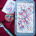 Red, White & Blue Funfetti Ice Cream - Homemade cake batter ice cream packed with festive sprinkles and crushed funfetti cookies bring a sweet, colorful treat to your summer celebrations.