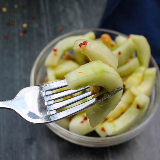 Sweet and spicy, with flavors of toasted sesame and fresh peanuts, this easy Asian Cucumber Salad is flavorful and light, a delicious and unique side dish.