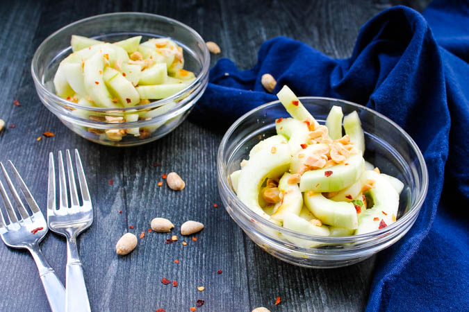 Sweet and spicy, with flavors of toasted sesame and fresh peanuts, this easy Asian Cucumber Salad is flavorful and light, a delicious and unique side dish.