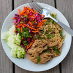 Sweet yet spicy pulled pork, quick pickled vegetables and hearty brown rice is my new favorite summer combo - Slow Cooker Pork Bahn Mi Bowls with Pickled Vegetables. With bright flavors, you don't even need to turn on the oven to enjoy this satisfying meal! 