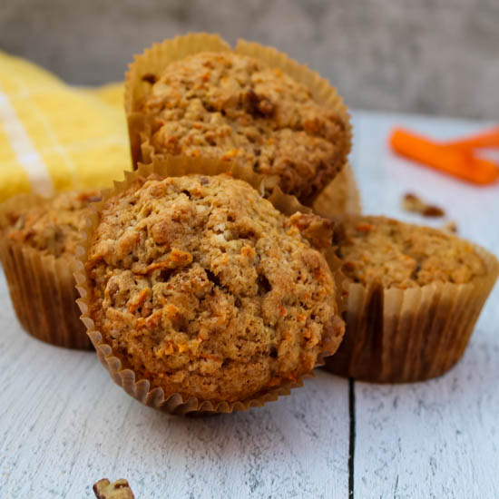 Celebrate spring and carrot cake season with these Carrot Cake Muffins - Any muffin that tastes like a dessert is a Breakfast Win in my book and as an added bonus, get in some veggies before lunch! 