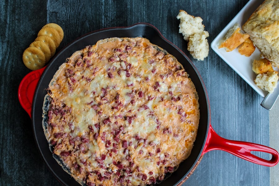 This Hot Reuben Dip tastes just like the sandwich. Corned beef, sauerkraut, Thousand Island dressing and Swiss cheese are mixed together and served piping hot - in a hearty dip great for fall and winter entertaining and game days. 