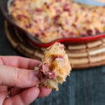 This Hot Reuben Dip tastes just like the sandwich. Corned beef, sauerkraut, Thousand Island dressing and Swiss cheese are mixed together and served piping hot - in a hearty dip great for fall and winter entertaining and game days. 