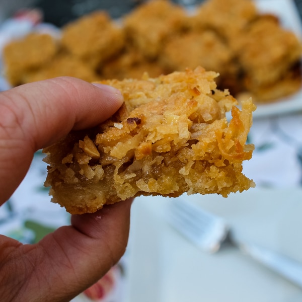 These Coconut Macadamia Nut Bars are an unexpected, bar cookie - a shortbread crust topped with a sweet and salty mix of coconut and macadamia nuts.