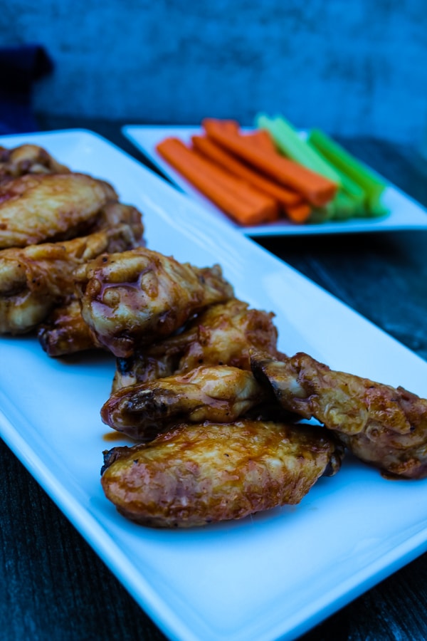 Cooking chicken wings in the air fryer creates a wonderfully crispy wing. Cook and then toss in your favorite BBQ sauce for a great snack, game day appetizer, or fun dinner.