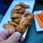 Cooking chicken wings in the air fryer creates a wonderfully crispy wing. Cook and then toss in your favorite BBQ sauce for a great snack, game day appetizer, or fun dinner.