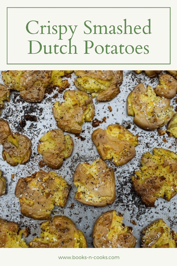 Crispy smashed dutch potatoes on a baking sheet, fresh from the oven.