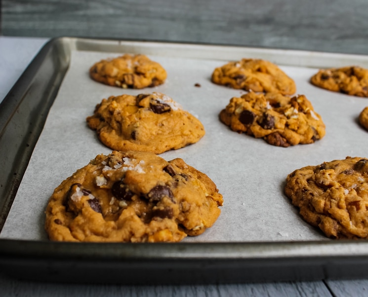 Salted Butterscotch Pretzel Cookies (22) on a parchment-covered baking sheet