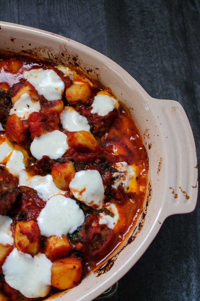 Overhead view of a baking dish filled with Italian Meatball Gnocchi Bake