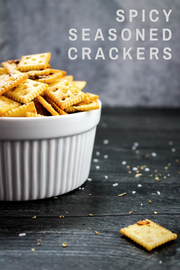 Want an easy semi-homemade snack or party munchie? These Spicy Seasoned Crackers are it! Toss mini saltines in seasoning and allow to sit overnight before baking at a low temperature. Serve these spicy, irresistible bites at room temperature for an easy party hit.