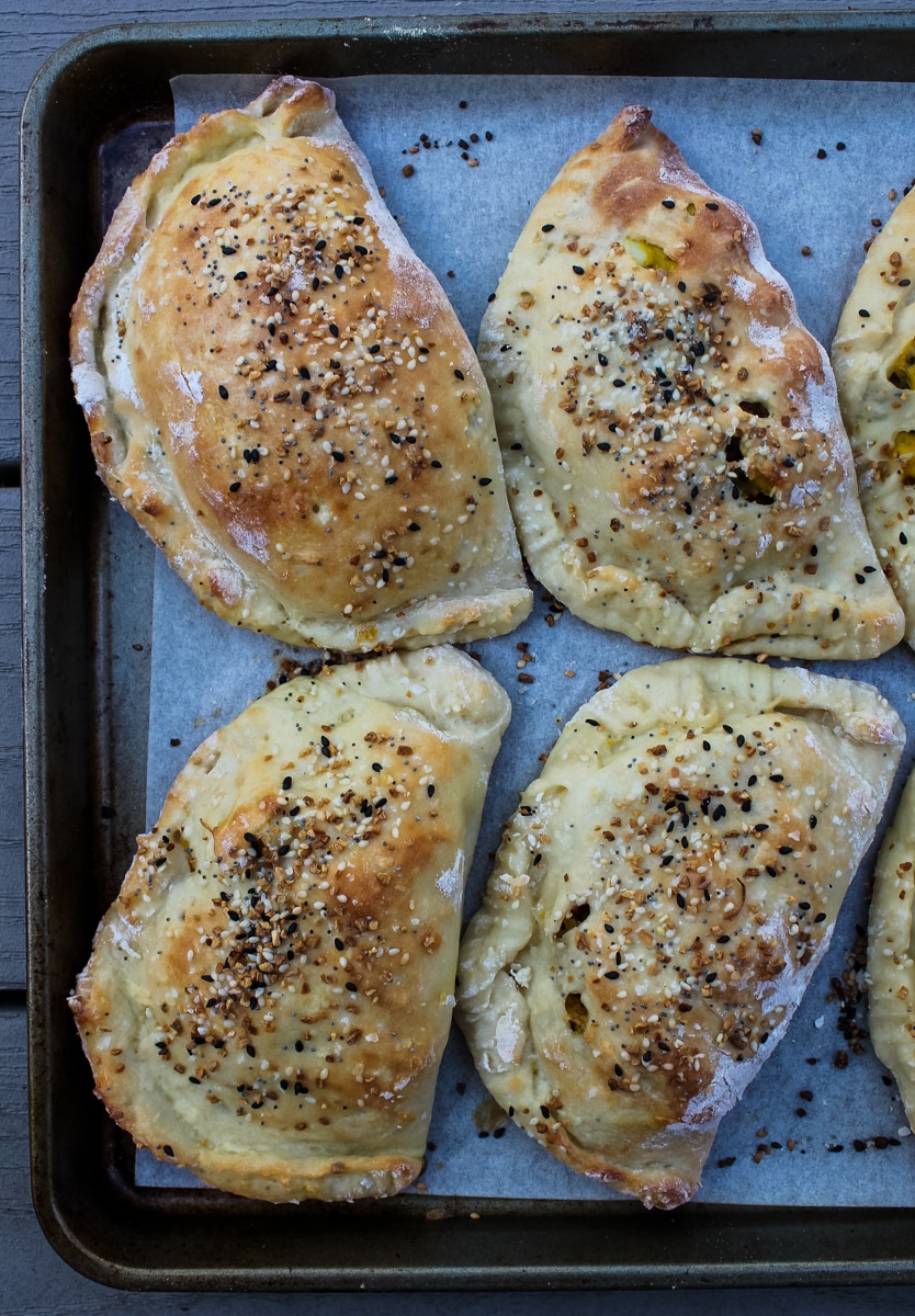 overhead view of Everything-but-the-Bagel Breakfast Pockets on a baking sheet