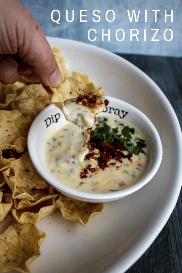 Creamy melty cheese is seasoned with cilantro, jalapeno, tomato and chorizo for an irresistible queso dip that feels like it's from your favorite Mexican restaurant.