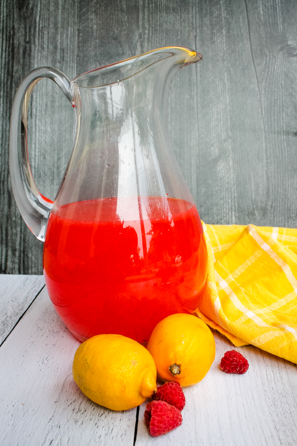 pitcher of Raspberry Lemonade Limoncello Cocktail from the side