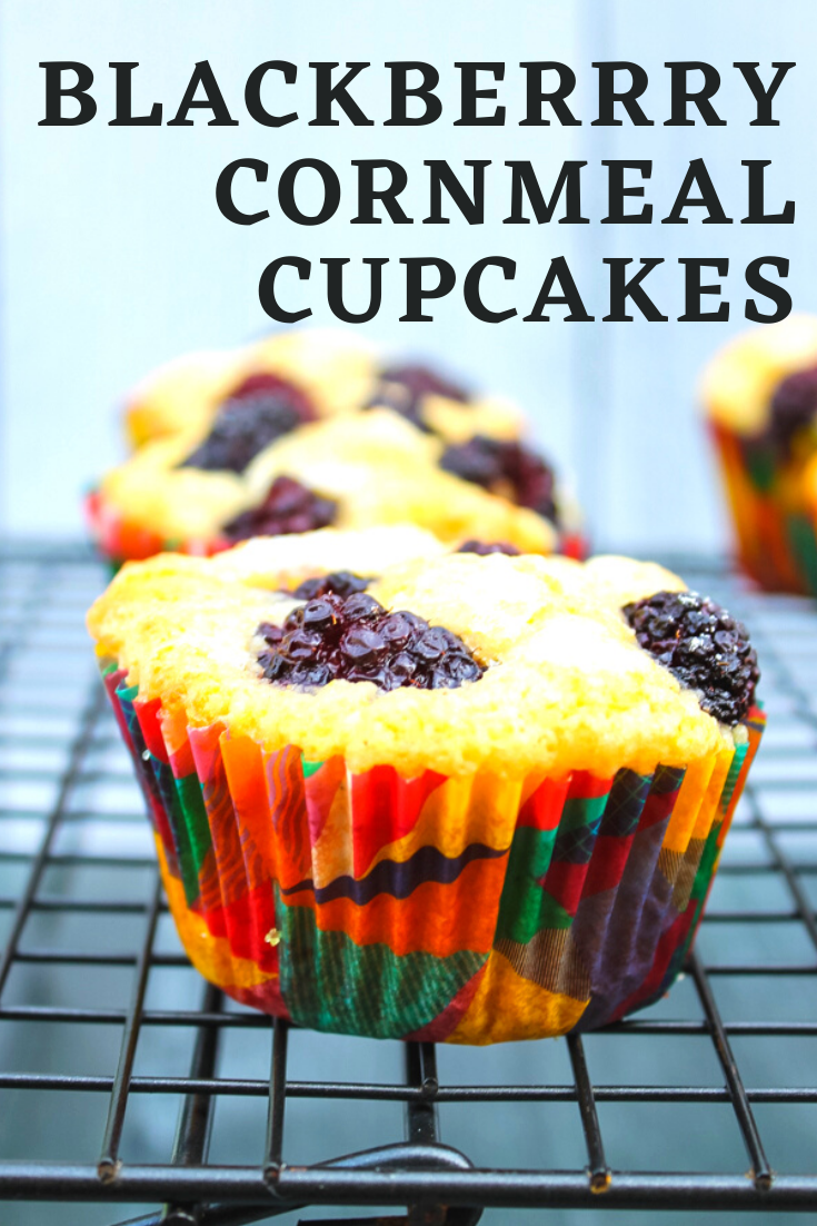 These Blackberry Cornmeal Cupcakes are an unexpected but delicious combo. The fresh blackberries are a burst of flavor in a just barely sweet cornmeal cupcake. 